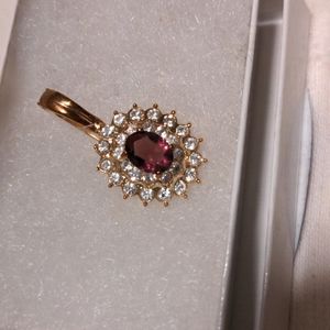 Gold jeweled pendant